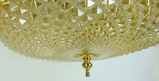Image 1 of mid century ceiling LAMP flush mount textured amber glass and brass 1970s