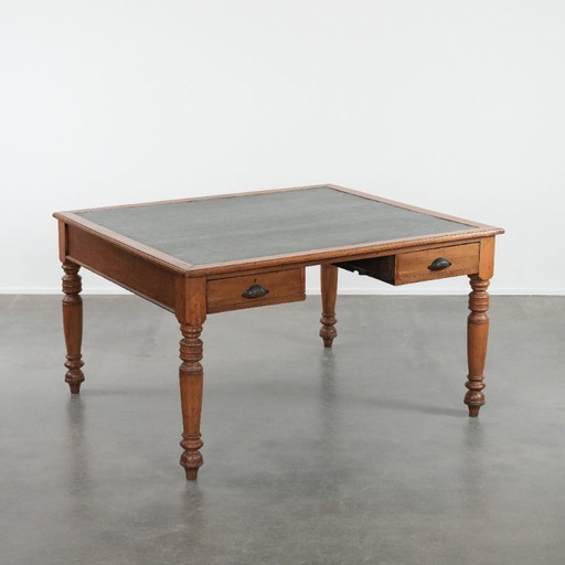 Antique writing table/partner desk with 4 drawers and a green leather top