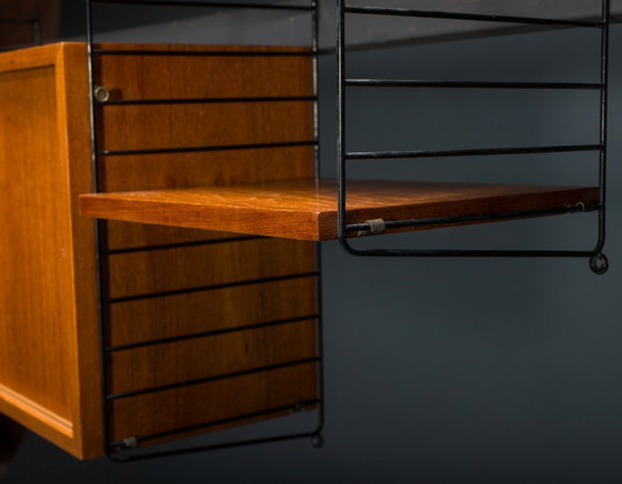 Image 1 of Modulaire wandplank in teak van Nils Strinning voor String, 1960, set van 29