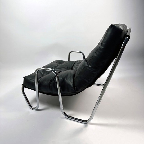 Image 1 of Poltrona vintage nera anni '70 con base cromata