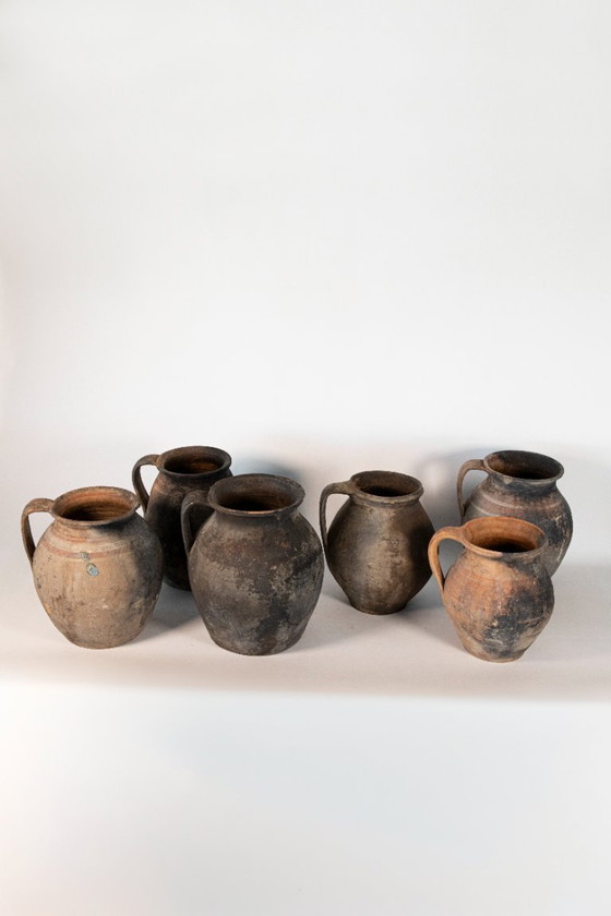 Image 1 of Set di sei brocche in terracotta