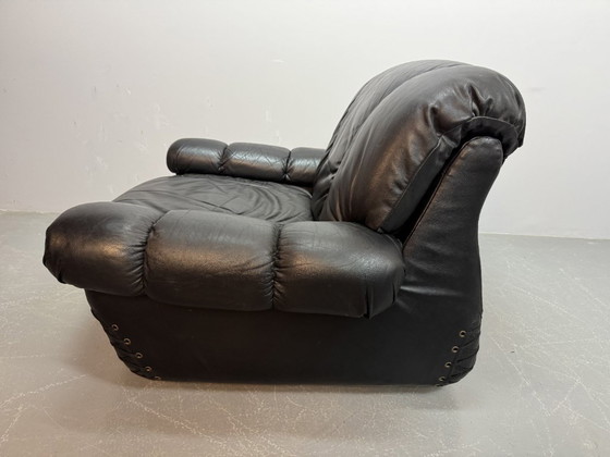 Image 1 of Beautiful Big Black Leather Postmodern Italian Design Space Age Lounge Chair with Brass Buttons and Playful Cord Lacing, 1970s.