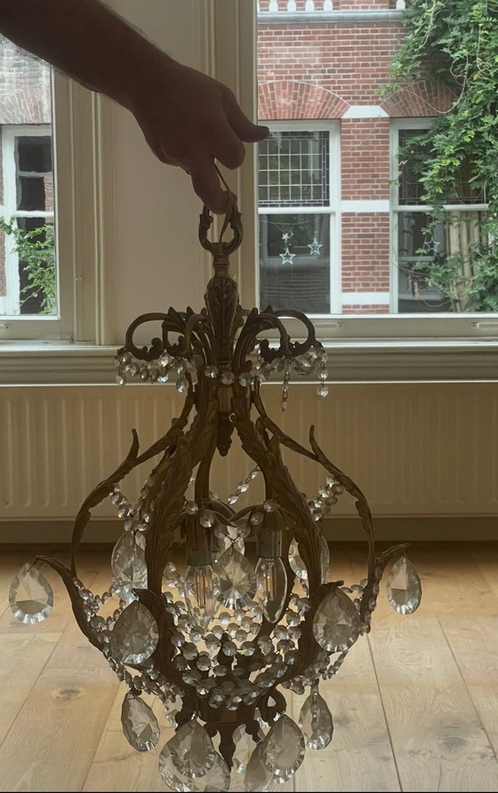 Image 1 of Lèche-bottes bronzées vintage