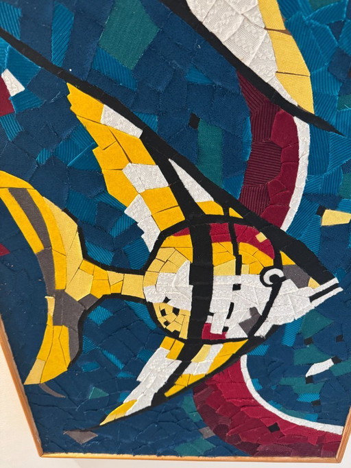 Vintage textile artwork with fish