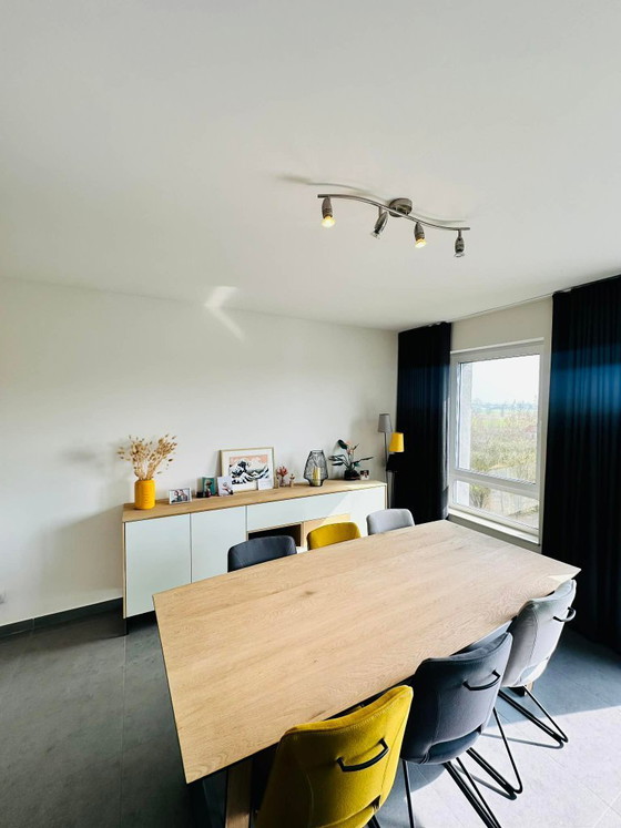 Image 1 of Ensemble XOOON Darwin : buffet, meuble TV, table et chaises, table basse, table à manger et fauteuil.