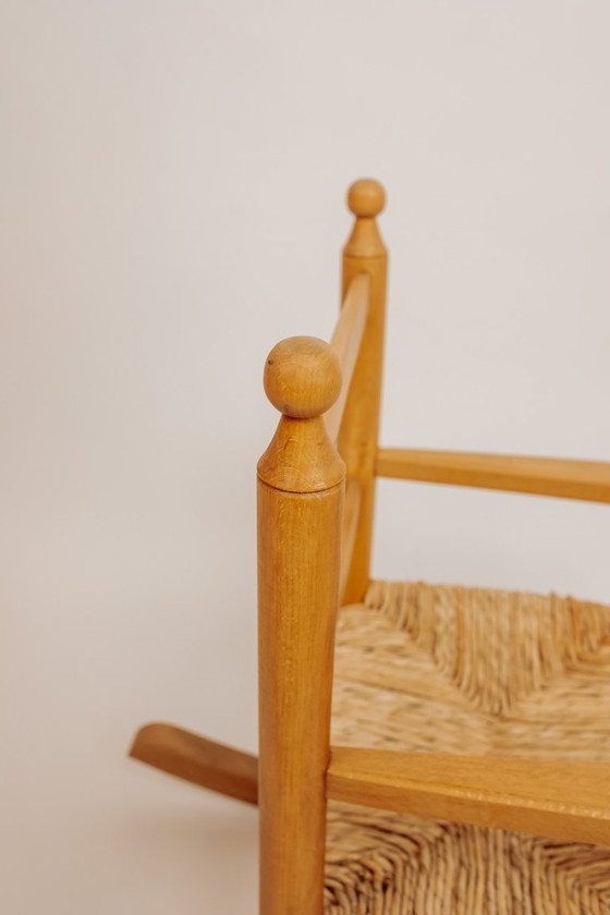 Image 1 of Vintage wooden children's rocking chair with rush seat