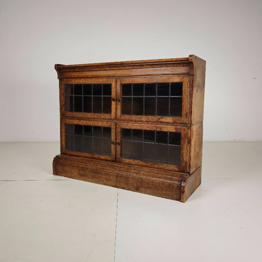 English oak bookcase by Minty Library Specialists, Oxford, 1920s