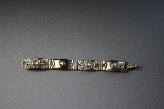 Image 1 of Bracelet by Luigi Briglia, silver-colored, set with clear, faceted stones and signed.