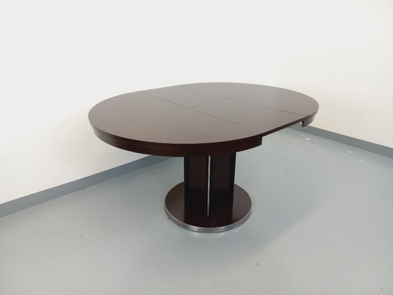 Image 1 of Table ronde de repas vintage en bois d’ébène et métal chromé style Space Age / Diner des années 70 avec rallonge intégrée
