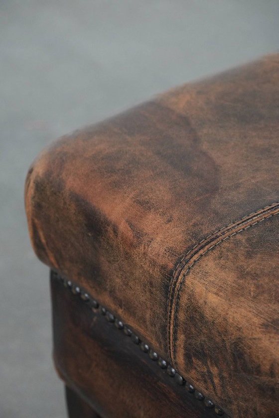 Image 1 of Vintage schapenleren hocker met mooie kleuren