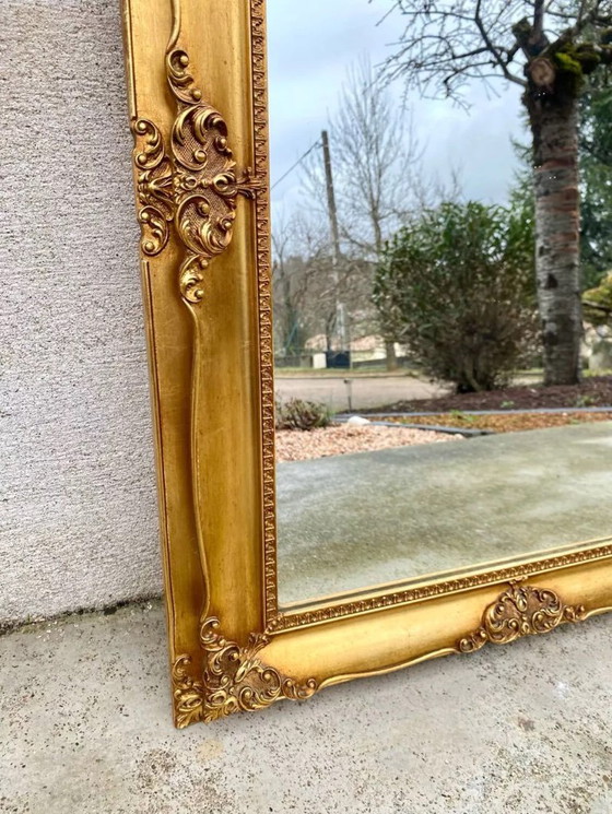 Image 1 of Beveled mirror in gilded wood