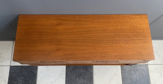 Image 1 of Piccola credenza in teak con frontale in fettuccia, anni '60