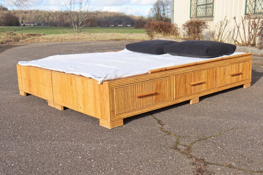 Vintage rattan bed by Audoux Minet