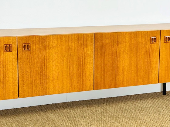 Image 1 of Minimalist Scandinavian sideboard in teak with black metal legs, 1960