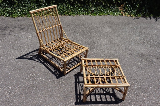Poltrona e poggiapiedi in rattan di Audoux & Minet, 1950