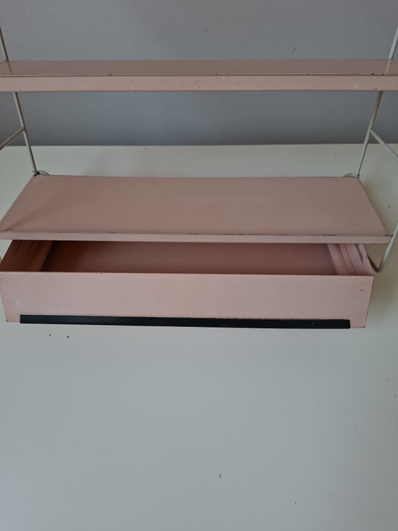 Image 1 of Raro estante de pared con la marca Tomado Holland