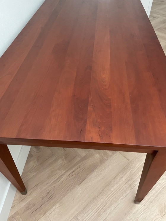 Image 1 of wooden dining table