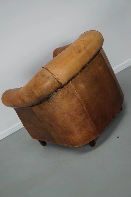 Image 1 of Vintage Nederlandse clubfauteuil in cognackleurig leer