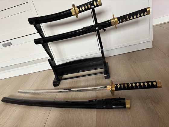 Image 1 of Decorative Daishō samurai sword set with wooden stand