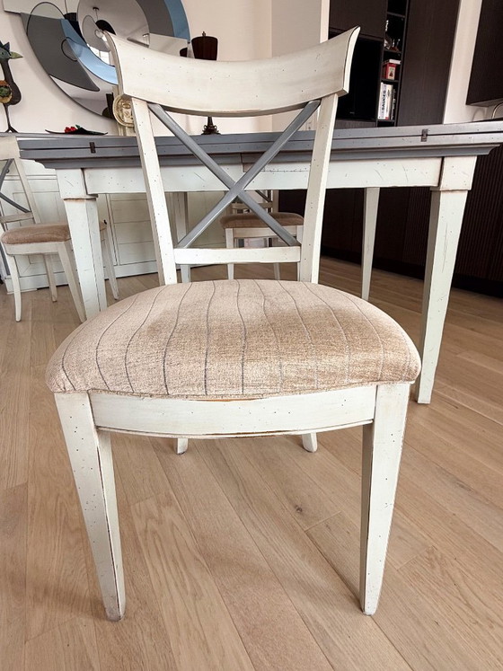Image 1 of Handkerchief table with 4 leaves and 4 chairs