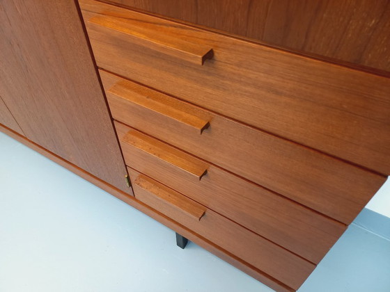 Image 1 of Tall, modernist, vintage Scandinavian sideboard in teak and black metal from the 1960s
