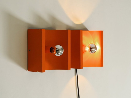 Image 1 of Pair of rare original 1960s Space Age metal wall lamps by Klaus Hempel for Kaiser Leuchten in orange