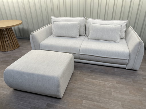 Sofa bed with footstool