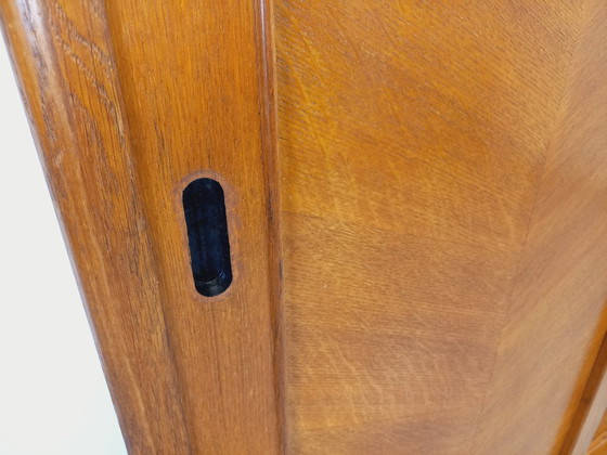 Image 1 of Vintage eikenhouten kledingkast uit de jaren 60