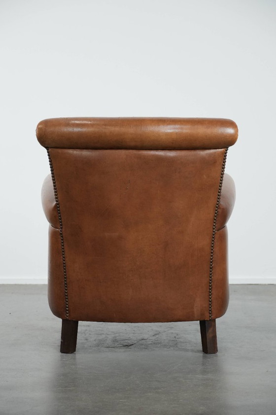 Image 1 of Vintage schapenleren fauteuil/ armchair met prachtige en warme kleuren