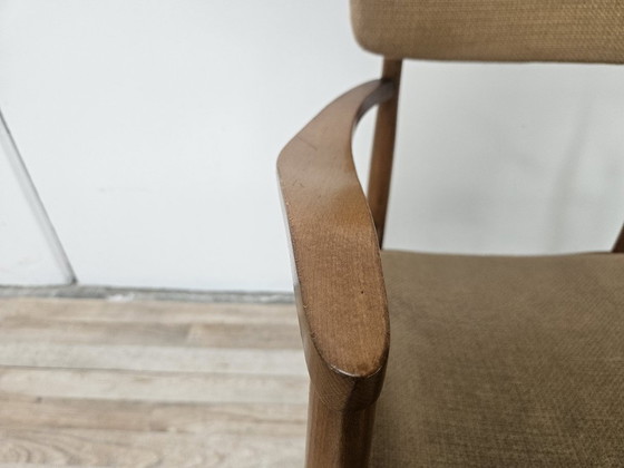 Image 1 of Zweedse fauteuil van hout met bruine stof