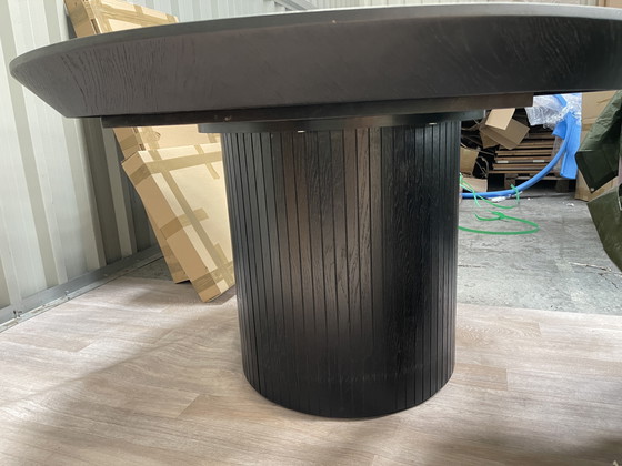 Image 1 of Round extendable dining table black oak
