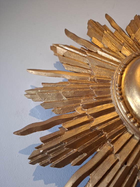 Image 1 of 46cm sun mirror in rare wood, 1950s version. Gold color.