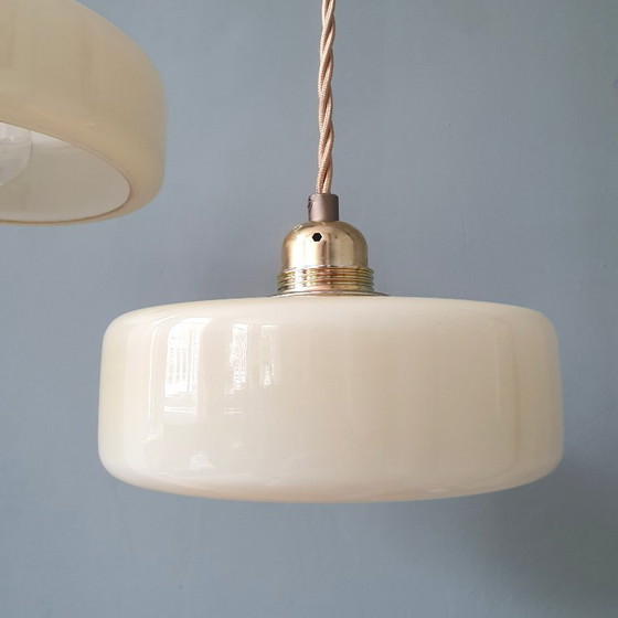 Image 1 of Vintage pendant lamp set (2) of yellow pastel opaline glass. Art Deco design.