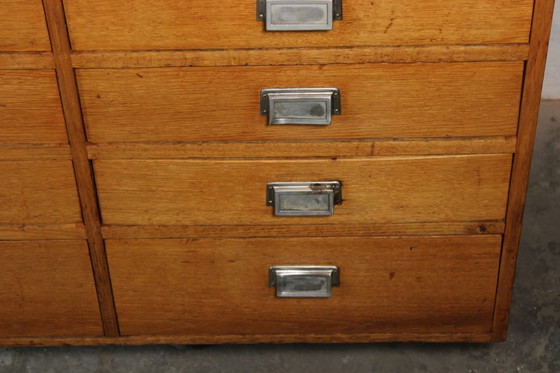 Image 1 of Grote antieke apothekerskast met 55 laden • Vintage hout