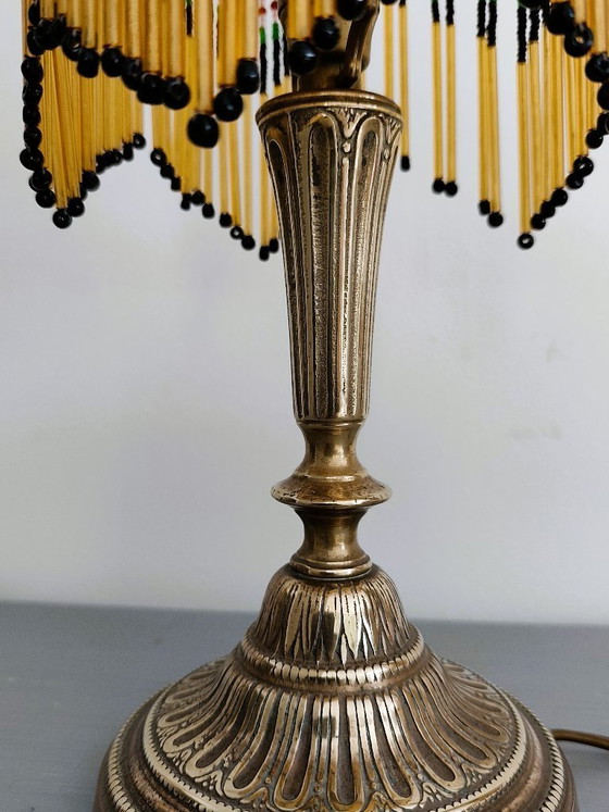 Image 1 of Antieke gouden tafellamp met kwastjes