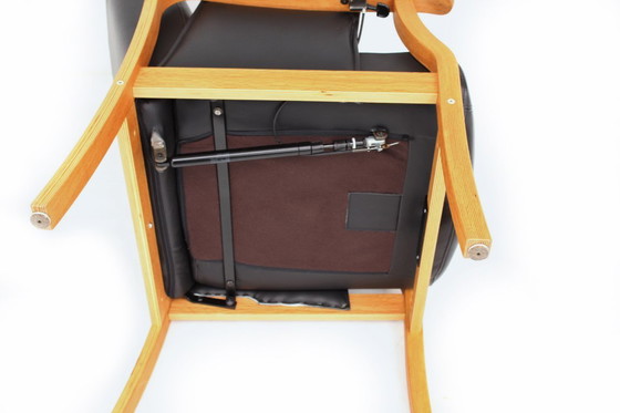 Image 1 of as new, Danish Nordic Easy Lounge Chair / Relax Armchair with stool in oak and leather.