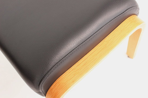 Image 1 of as new, Danish Nordic Easy Lounge Chair / Relax Armchair with stool in oak and leather.