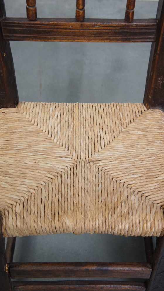 Image 1 of 2 x Antiker spanischer Stuhl mit Korbsitz