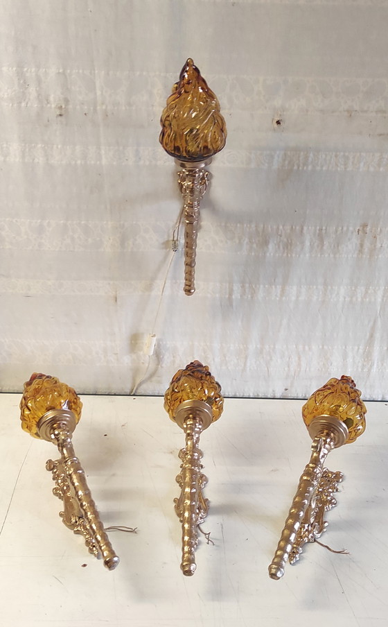 Image 1 of Torch-style wall sconces in gilded cast aluminum and glass - mid-20th century