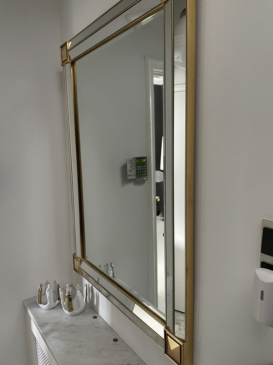 Image 1 of Gold mirror with beveled edge and corner accents