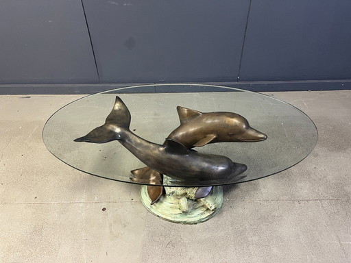 Bronzen salontafel met dolfijnmotief, gesigneerd door C. Caudion, jaren 1960.