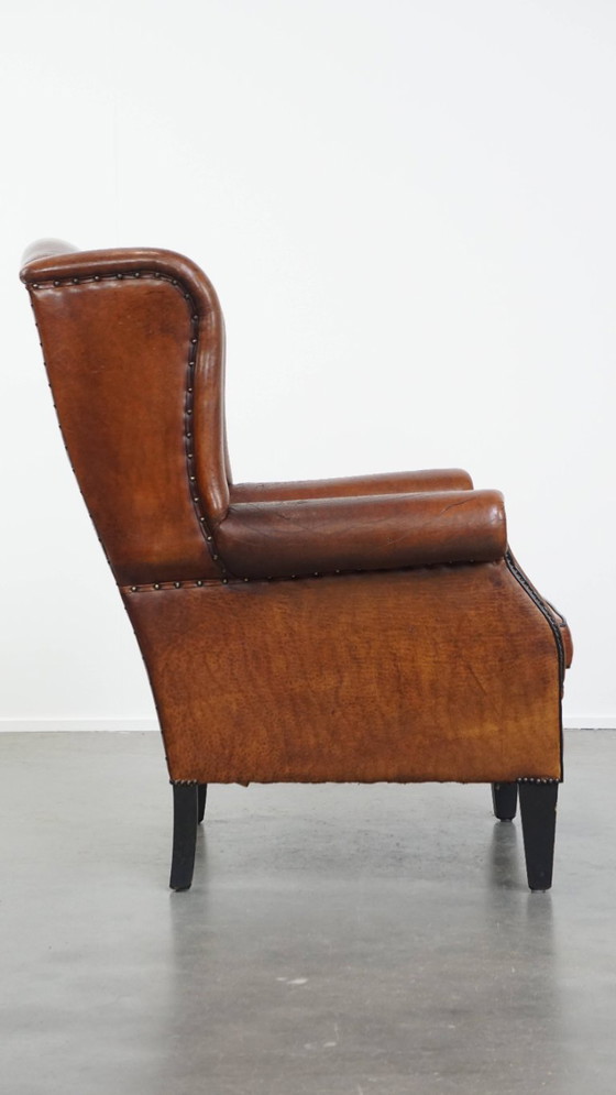Image 1 of Grote vintage schapenleren oorfauteuil