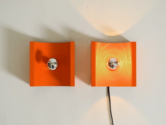 Image 1 of Pair of rare original 1960s Space Age metal wall lamps by Klaus Hempel for Kaiser Leuchten in orange