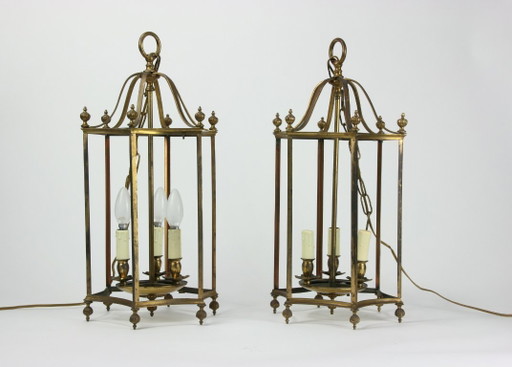 A set of brass pendant lamps – hanglampen