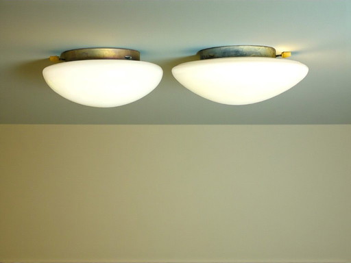 Pair of Art Deco style white opaline glass flush mount ceiling or wall lights 30 and 27cm