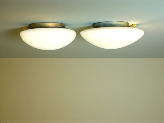 Image 1 of Pair of Art Deco style white opaline glass flush mount ceiling or wall lights 30 and 27cm