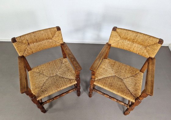 Image 1 of Vintage Franse Armleuningstoelen | Eiken en Riet
