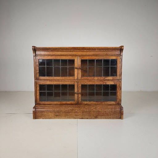 English oak bookcase by Minty Library Specialists, Oxford, 1920s