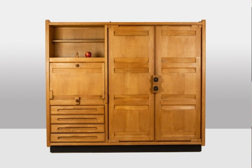 Guillerme e Chambron. Armadio in rovere con scrivania integrata. 1970-80