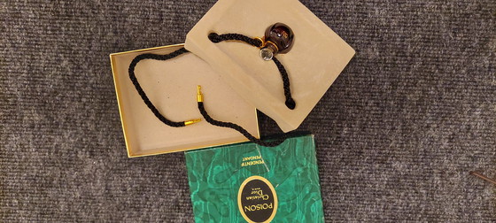 Image 1 of Poison miniature glass bottle pendant by Christian Dior